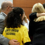 Judge Elizabeth Scherer hugs Jennifer Guttenberg following the sentencing