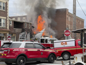 Emergency personnel work at the site of a deadly explosion at a Pennsylvania chocolate factory.