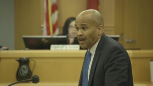 Lawrence Lewis gives opening statements