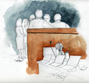Sketch of Lori Vallow Daybell at counsel table during a sidebar