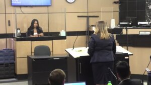 Dominique Jones is cross-examined by defense attorney Heidi Perlet
