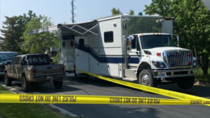 Layton Police Department mobile command center and police tape.