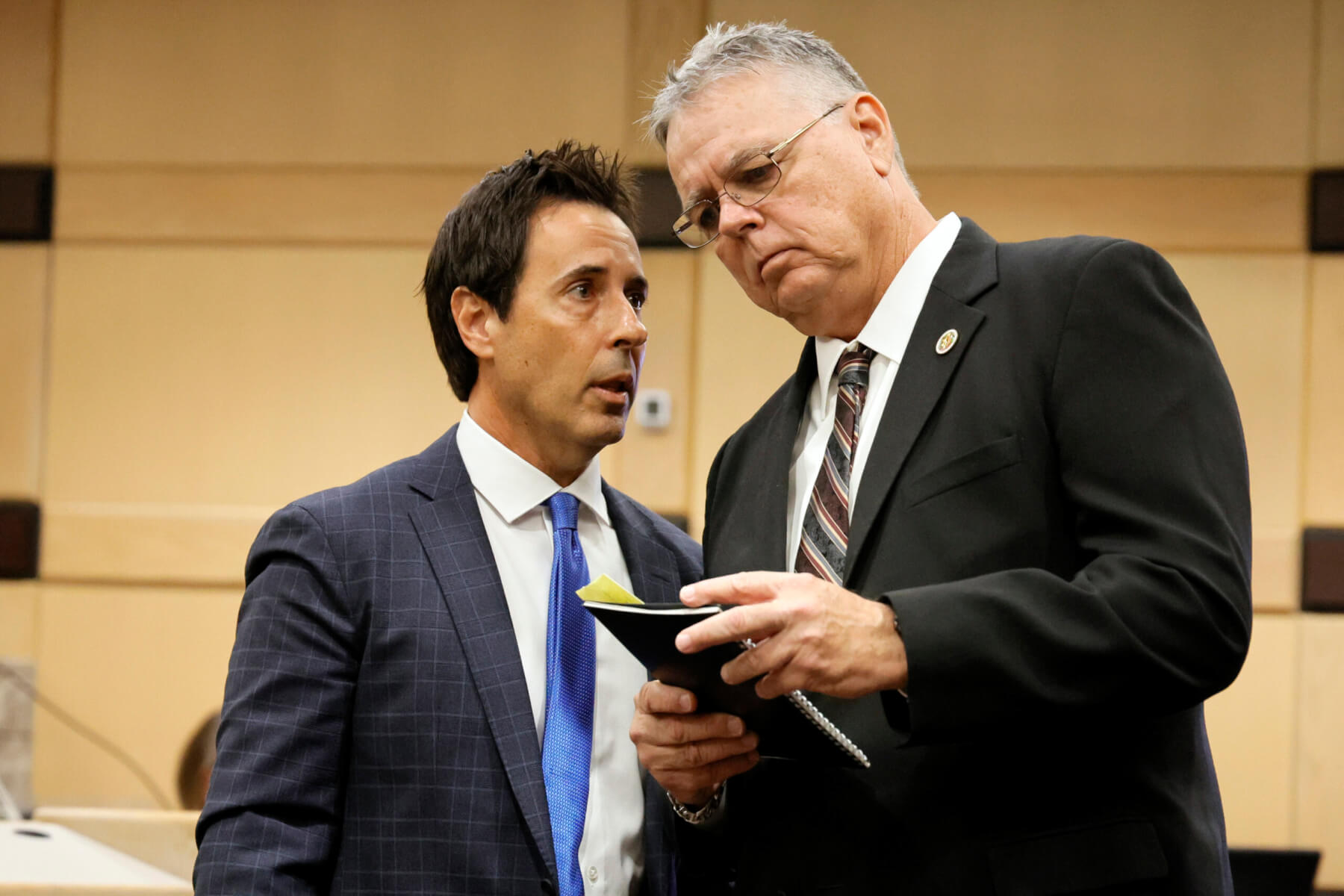 Former Marjory Stoneman Douglas High School School Resource Officer Scot Peterson, right, speaks with his defense lawyer Mark Eiglarsh in court.