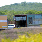 The property where seven bodies were found on Monday is shown near Henryetta