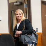 Public defender Anne Taylor enters a courtroom for Bryan Kohberger's arraignment hearing