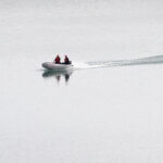 A police dingy navigates in the Arade dam near Silves