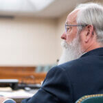 Latah County Prosecutor Bill Thompson listens during an arraignment hearing for Bryan Kohberger