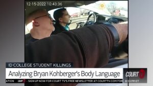 still from bodycamera video shows bryan kohberger and his father in a car