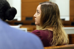 Lori Alhadeff sits in the courtroom gallery during jury preselection