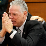Former Marjory Stoneman Douglas High School School Resource Officer Scot Peterson reacts as he is found not guilty.