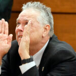 Former Marjory Stoneman Douglas High School School Resource Officer Scot Peterson reacts as he is found not guilty.