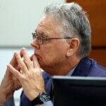 Scot Peterson sits at the defense table during his trial