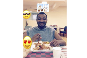 Undated photo shows Jordan Neely with food and emojis