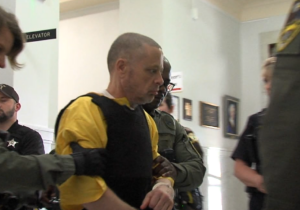Richard Allen, wearing a bullet proof vest and yellow jumpsuit, appeared in court
