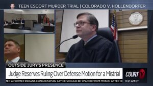 Judge speaks into a microphone in el paso county court