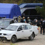 search teams arrive back to an operation tent near Barragem do Arade,