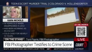 Toni Payne, FBI photographer, testifies with photos behind her