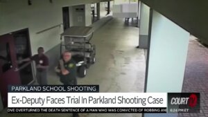 Surveillance video shows former deputy Scot Peterson responding to the Parkland School shooting.