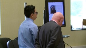 Mauricio Guerrero stands as he addresses the court during sentencing