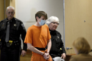 Logan Clegg is escorted into court