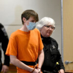 Logan Clegg is escorted into court