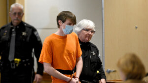 Logan Clegg is escorted into court