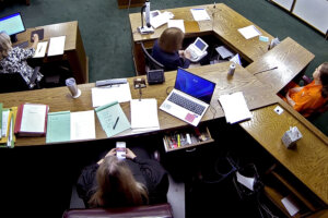 Traci Soderstrom looks at her cellphone during a murder trial on June 12, 2023