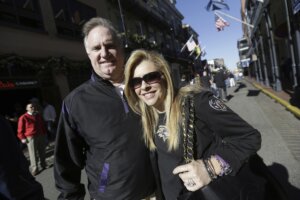 Sean and Leigh Anne Tuohy stand on a street in New Orleans
