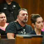 Buck Myre, father of Tate Myre, listens to the testimony of Dr. Colin King during Ethan Crumbley's hearing.