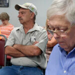 Darvin Markley at a Marion City Council meeting with Marion County Record editor and publisher Eric Meyer.