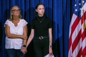Crystal Probst, left, and her daughter, Taylor Probst at a press conference
