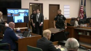 Bryan Kohberger walks into court flanked by security