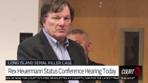 Rex Heuermann is seen in a suit in court