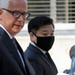 Attorney David Sanford, left, and Young Lee, right, brother of murder victim Hae Min Lee.