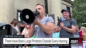 a man speaks into a bullhorn