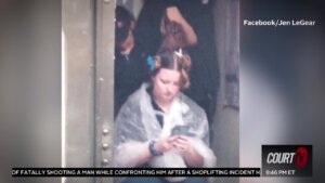 Woman gets haircut in Taco Bell.