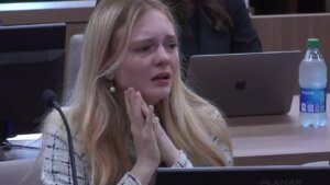 Maya Kowalski listens to the verdict being read in court