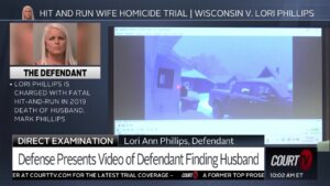 Screengrab of home security video played in court of Lori Phillips finding husband's body.