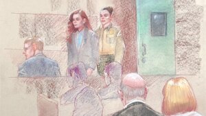 sketch shows Kaitlin Armstrong entering court