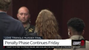 Kaitlin Armstrong stands in court