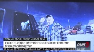 Ivan Brammer leans against a truck in bodyworn camera video