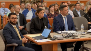 Kouri Richins sits in court at her counsel table.