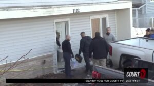 Police enter a house