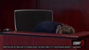 A woman vomits on the witness stand