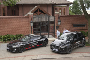 Private security outside the home of Oscar Pistorius' uncle