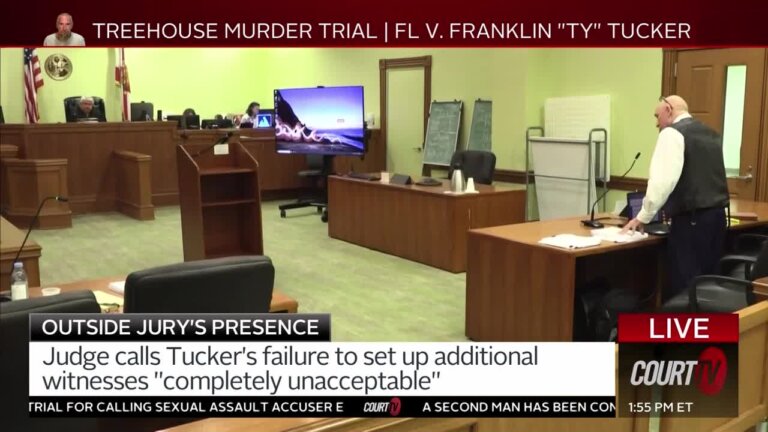Franklin Tucker stands in court