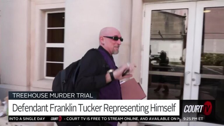 Franklin Tucker walks into court