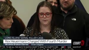 Woman speaks at podium during press conference