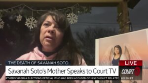 Gloria Cordova speaks to the camera while holding a photo of her daughter