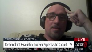 Franklin Tucker, wearing headphones